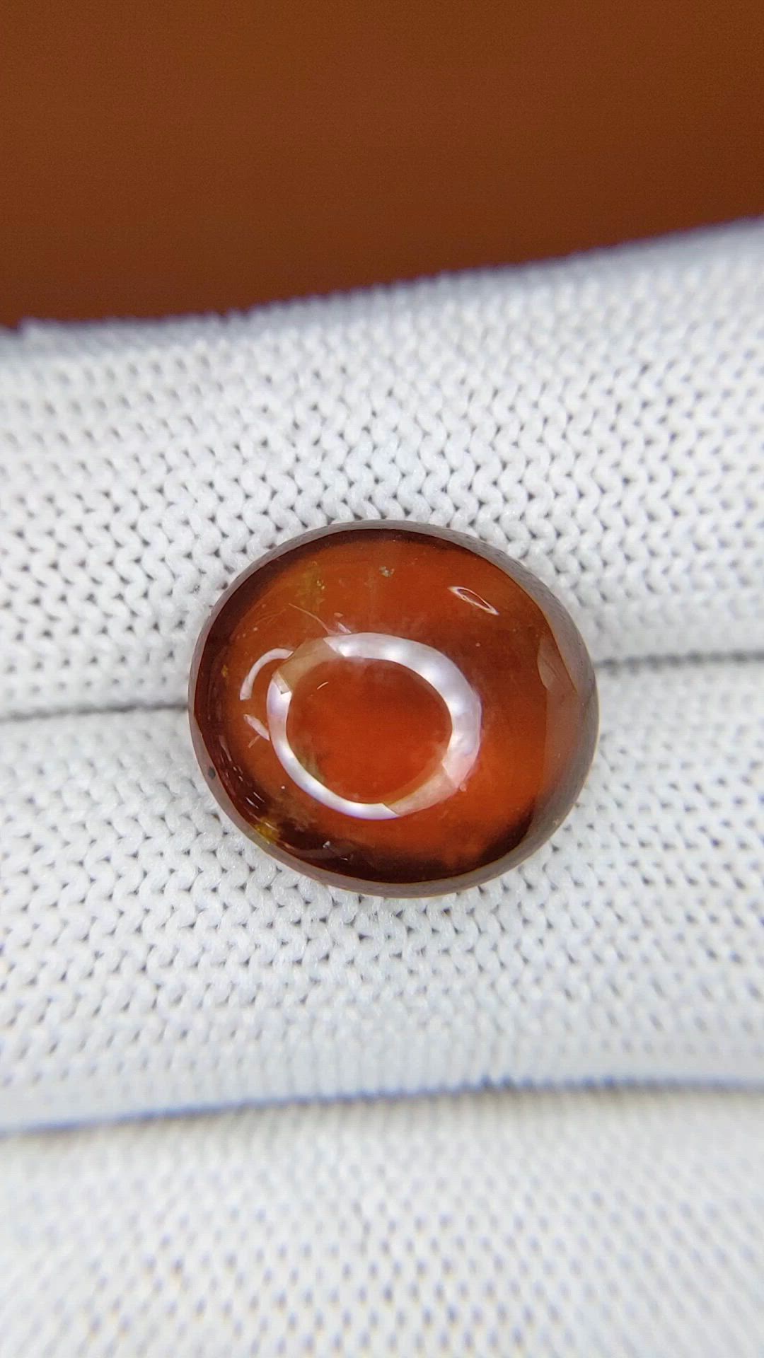 13.29 Ct. Reddish Orange Cabochon Hessonite Garnet from Madagascar Size Video