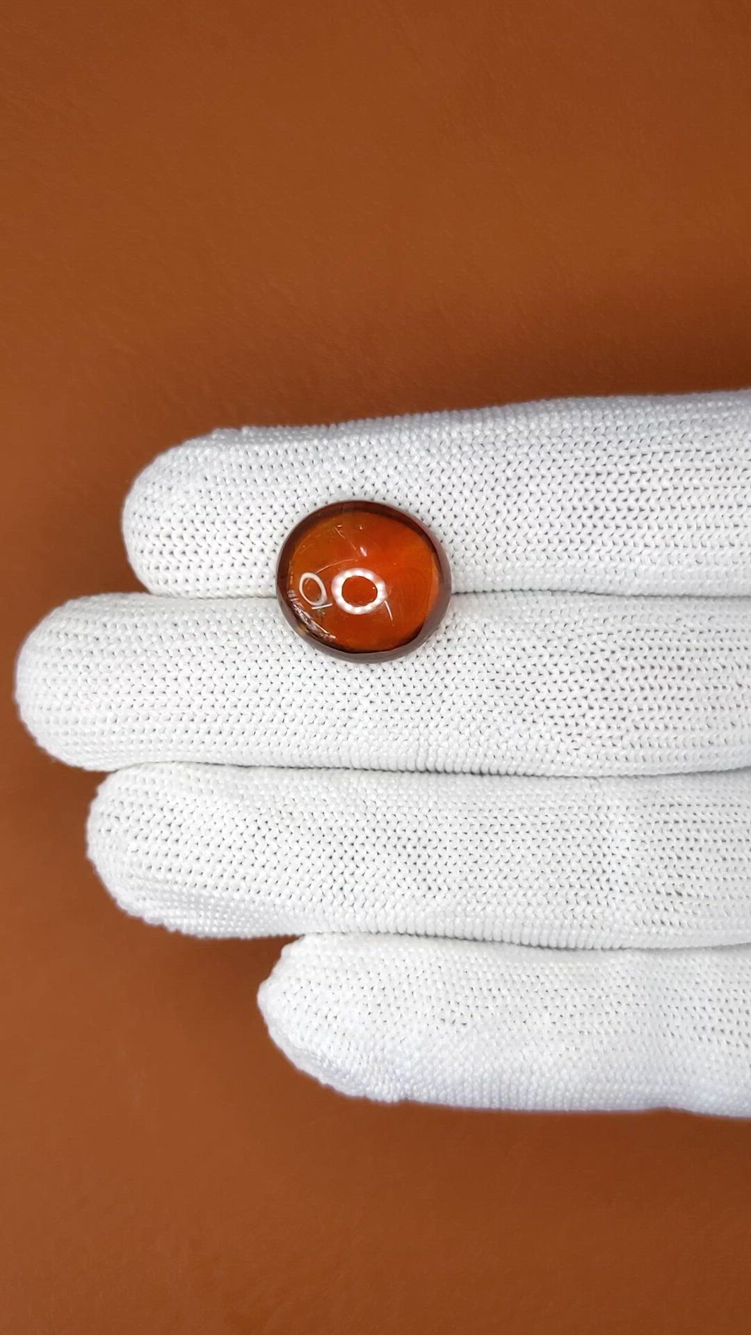 13.29 Ct. Reddish Orange Cabochon Hessonite Garnet from Madagascar Size Video