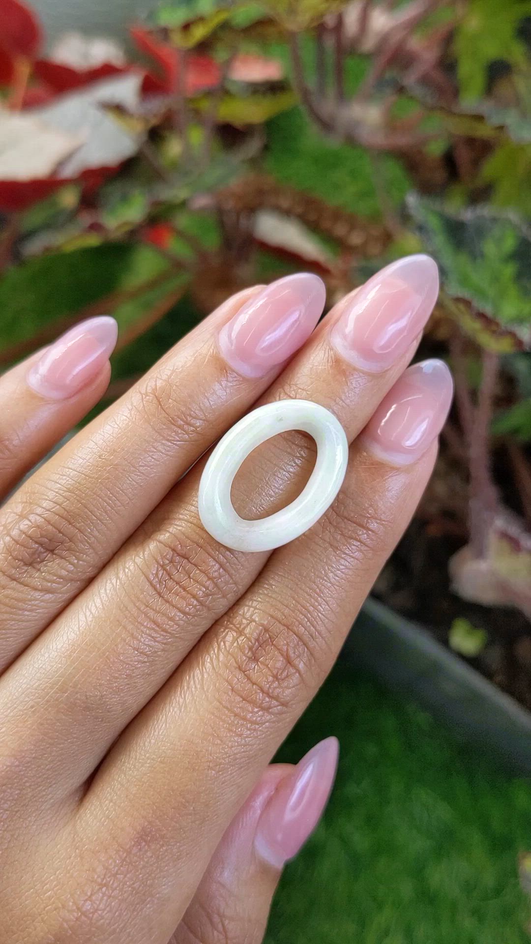 12.18 Ct. Yellowish Green Jade from China Size Video