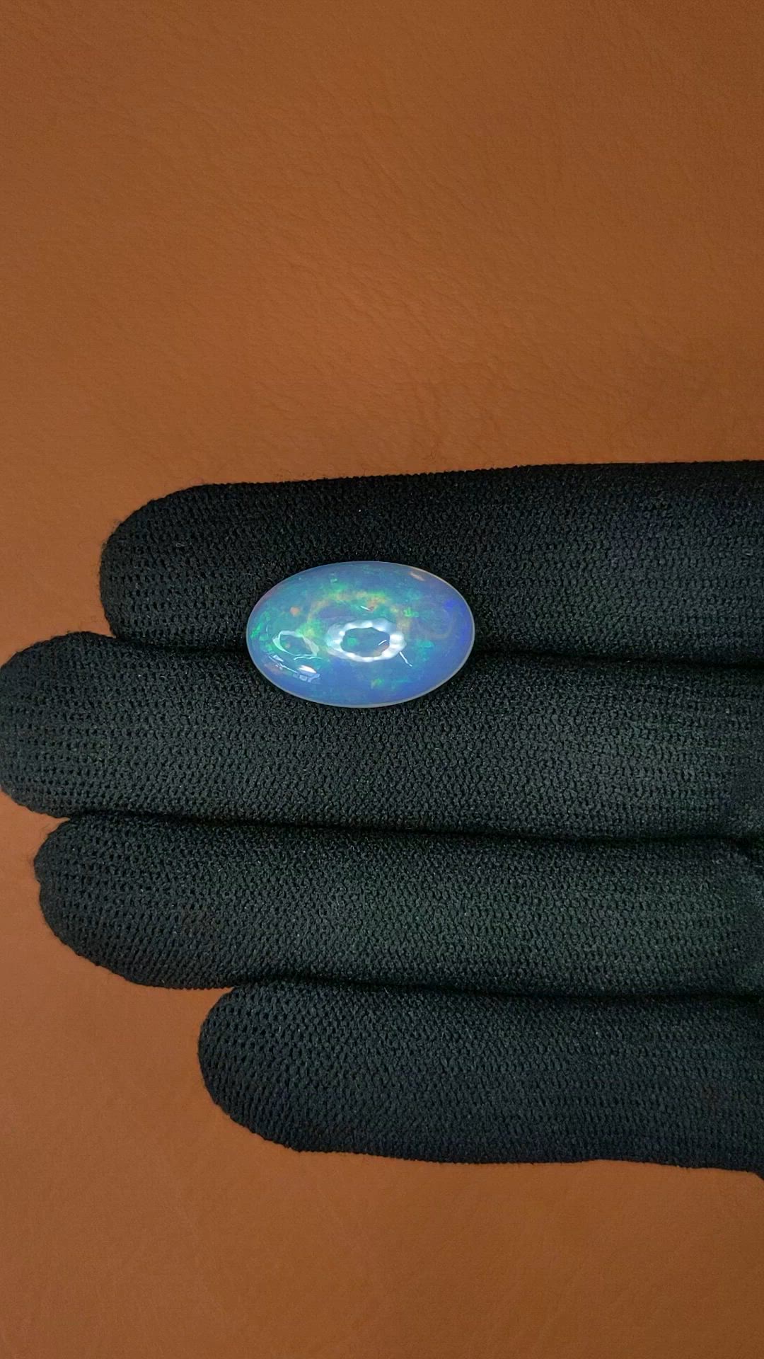 10.72 Ct. Multi Color Cabochon White Opal (Light Opal) from Ethiopia Size Video