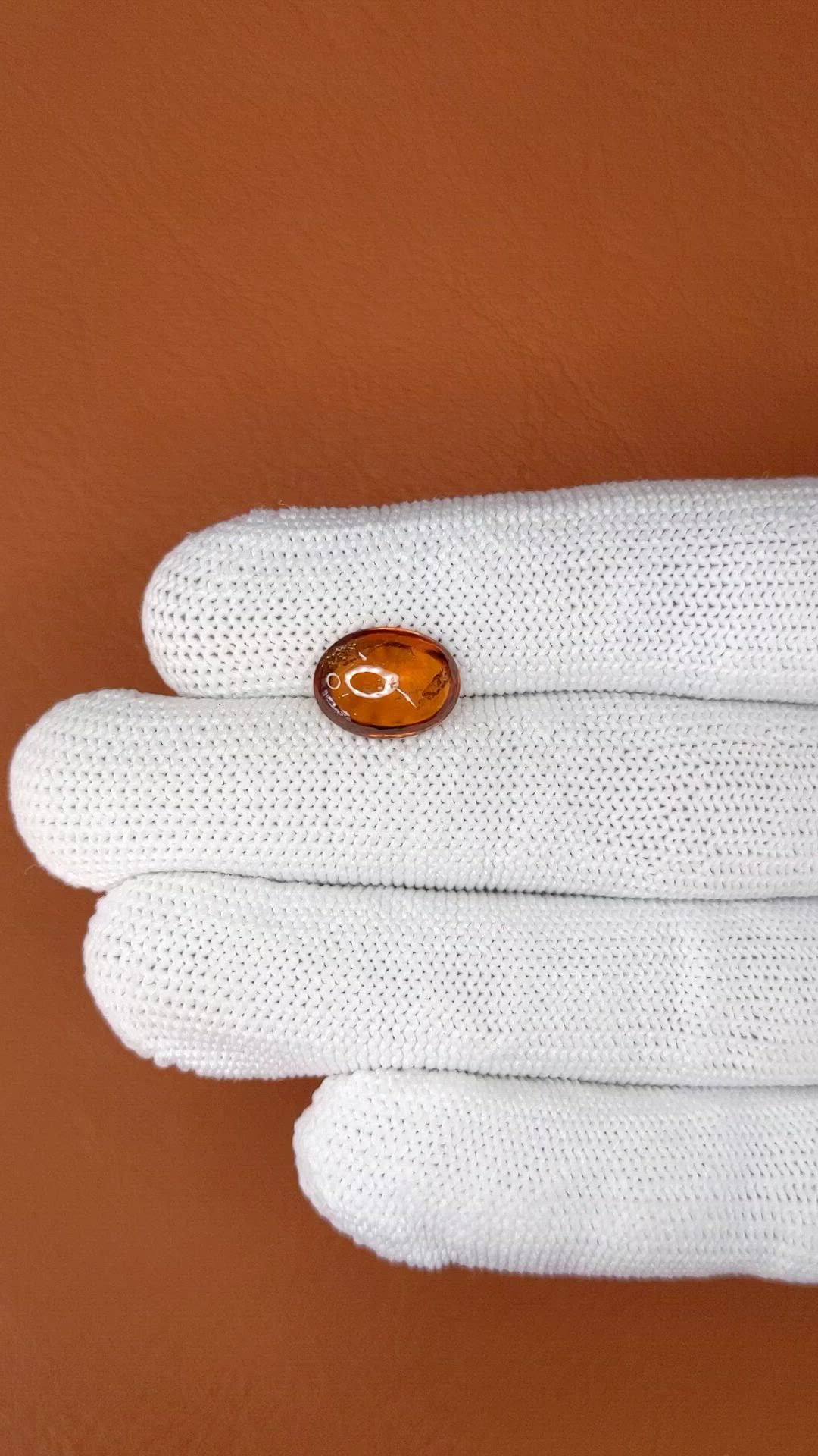 4.37 Ct. Reddish Orange Cabochon Hessonite Garnet from Madagascar Size Video