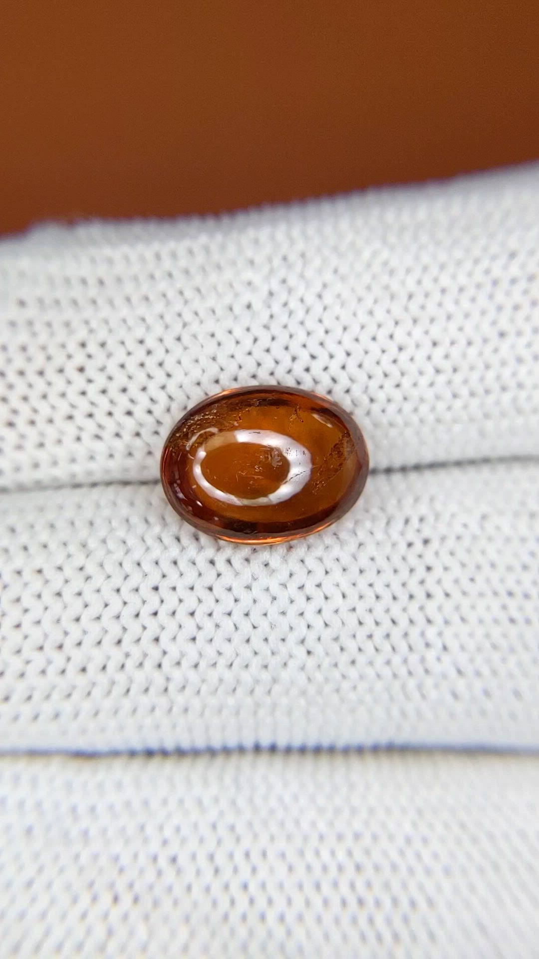 4.37 Ct. Reddish Orange Cabochon Hessonite Garnet from Madagascar Size Video