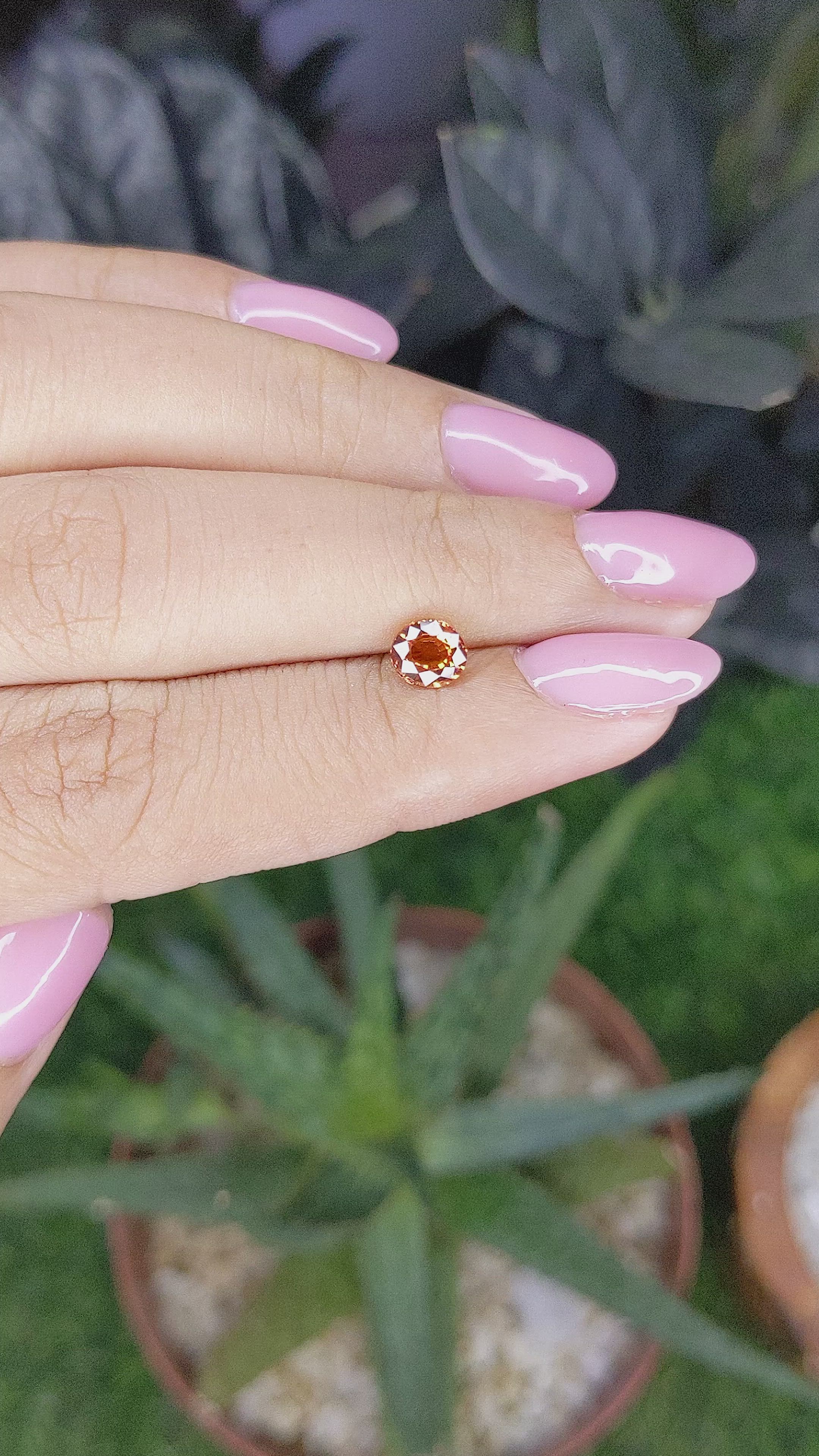 0.80 Ct. Orange Spessartite Garnet from Madagascar Size Video