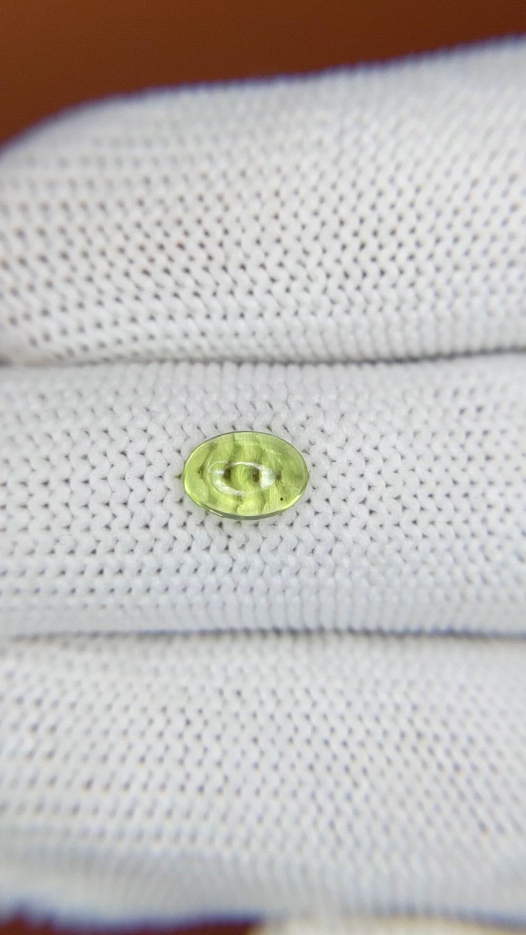0.74 Ct. Green (Lime Green) Cabochon Peridot from Ceylon (Sri Lanka) Size Video
