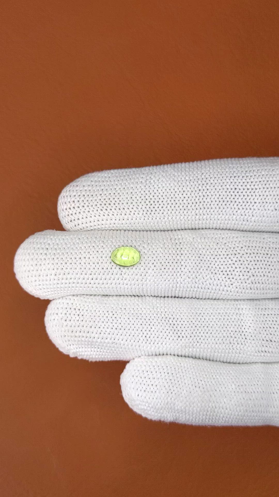 0.74 Ct. Green (Lime Green) Cabochon Peridot from Ceylon (Sri Lanka) Size Video