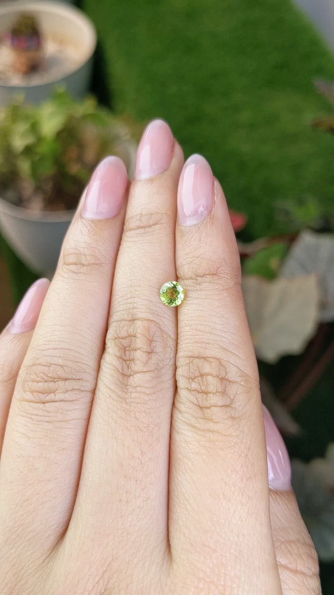 0.56 Ct. Yellowish Green Peridot from Ceylon (Sri Lanka) Size Video
