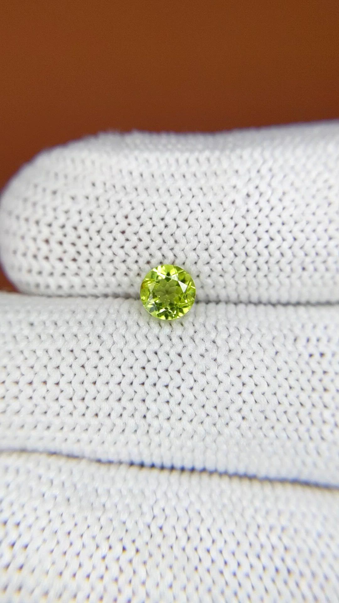 0.56 Ct. Yellowish Green Peridot from Ceylon (Sri Lanka) Size Video