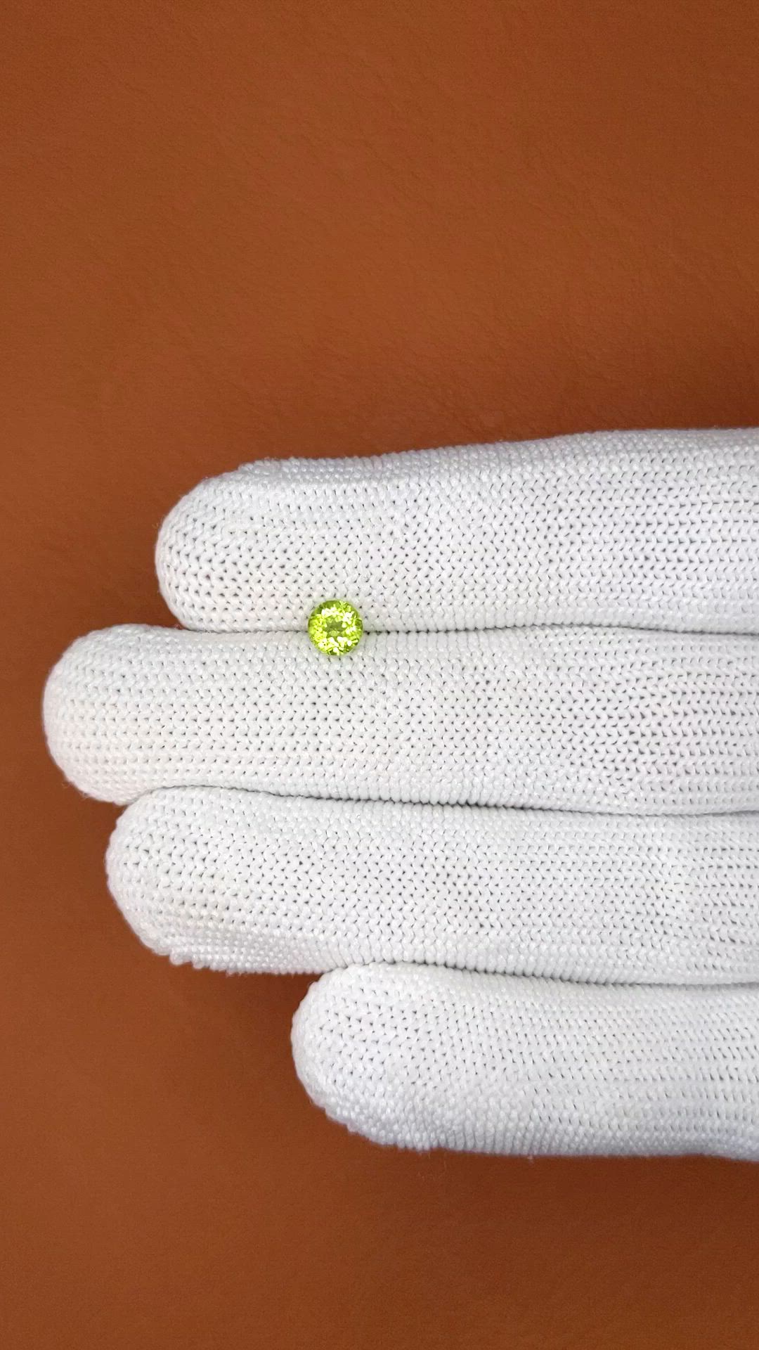 0.56 Ct. Yellowish Green Peridot from Ceylon (Sri Lanka) Size Video