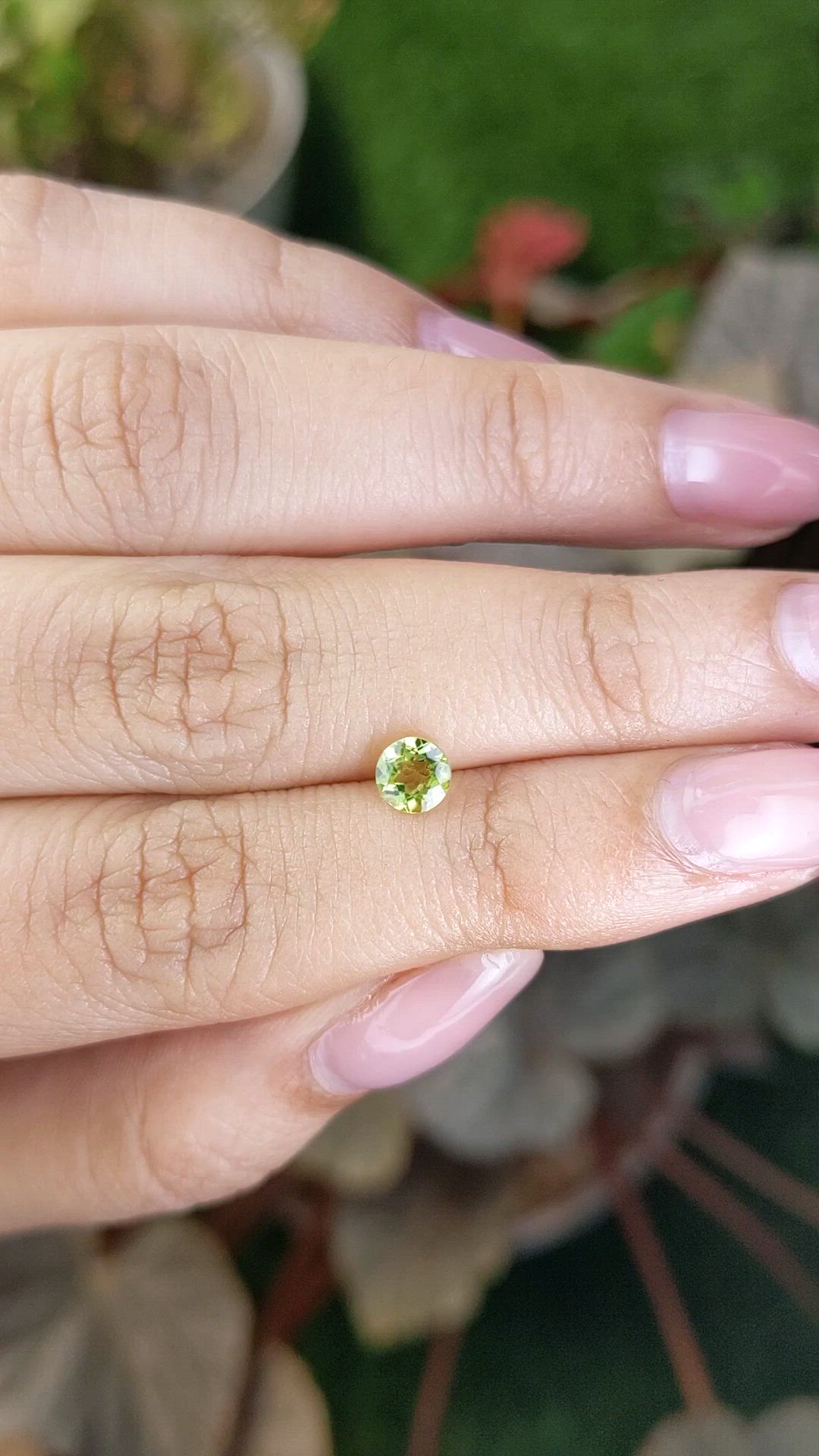 0.56 Ct. Yellowish Green Peridot from Ceylon (Sri Lanka) Size Video