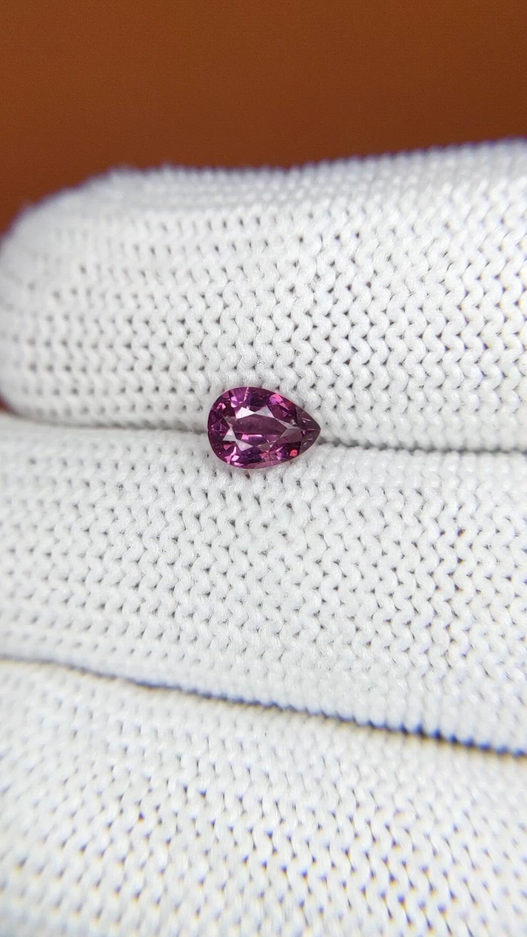 0.69 Ct. Pinkish Purple Rhodolite Garnet from Ceylon (Sri Lanka) Size Video