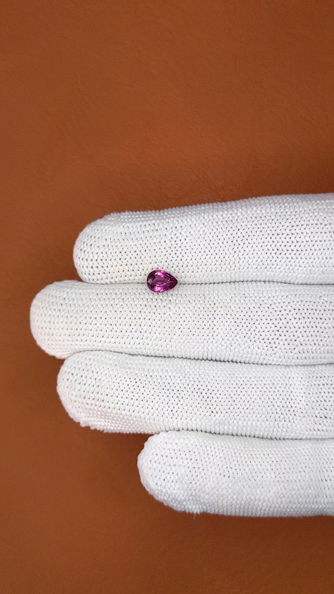 0.69 Ct. Pinkish Purple Rhodolite Garnet from Ceylon (Sri Lanka) Size Video