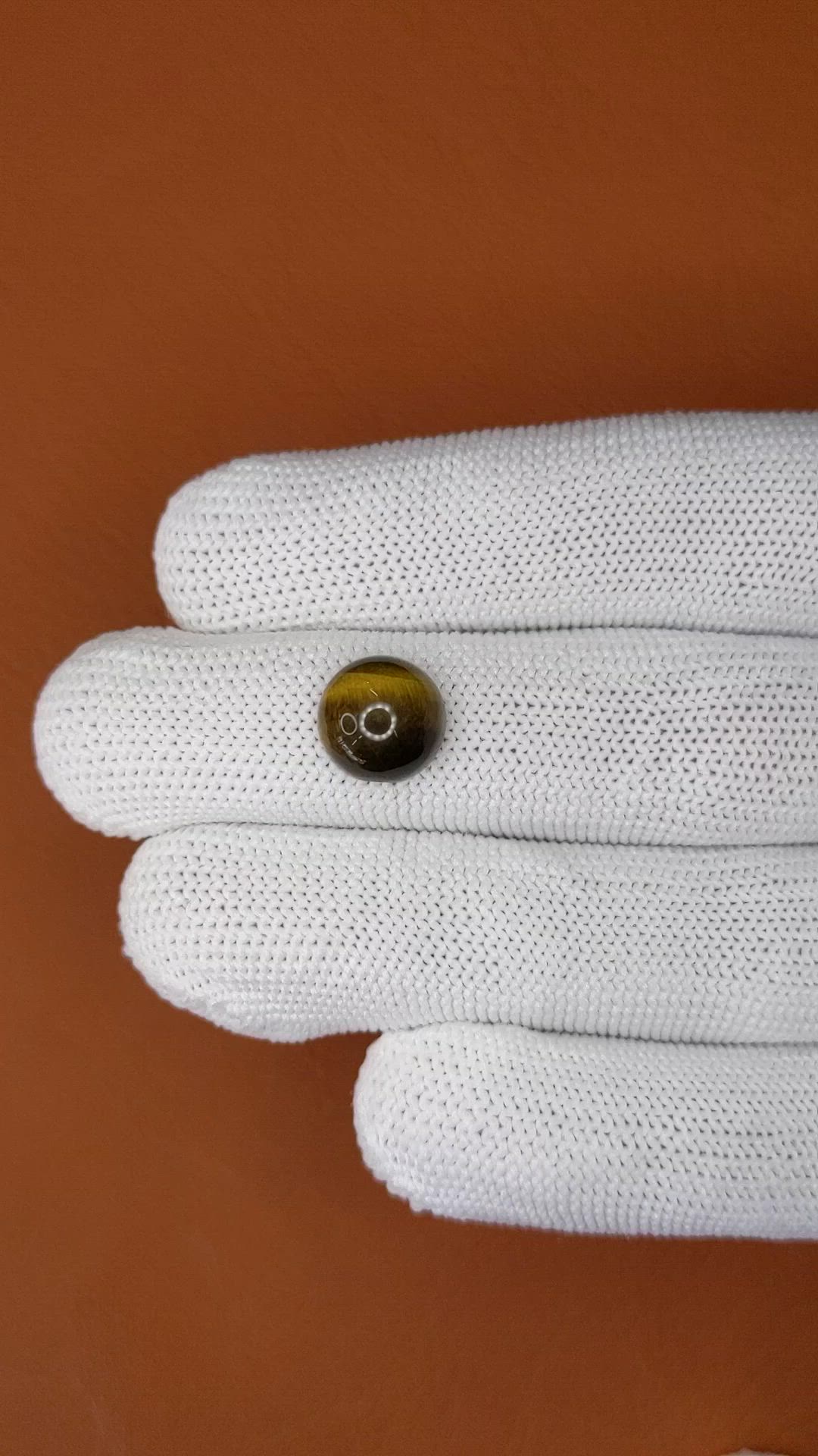 4.19 Ct. Cabochon Tiger's Eye from Ceylon (Sri Lanka) Size Video