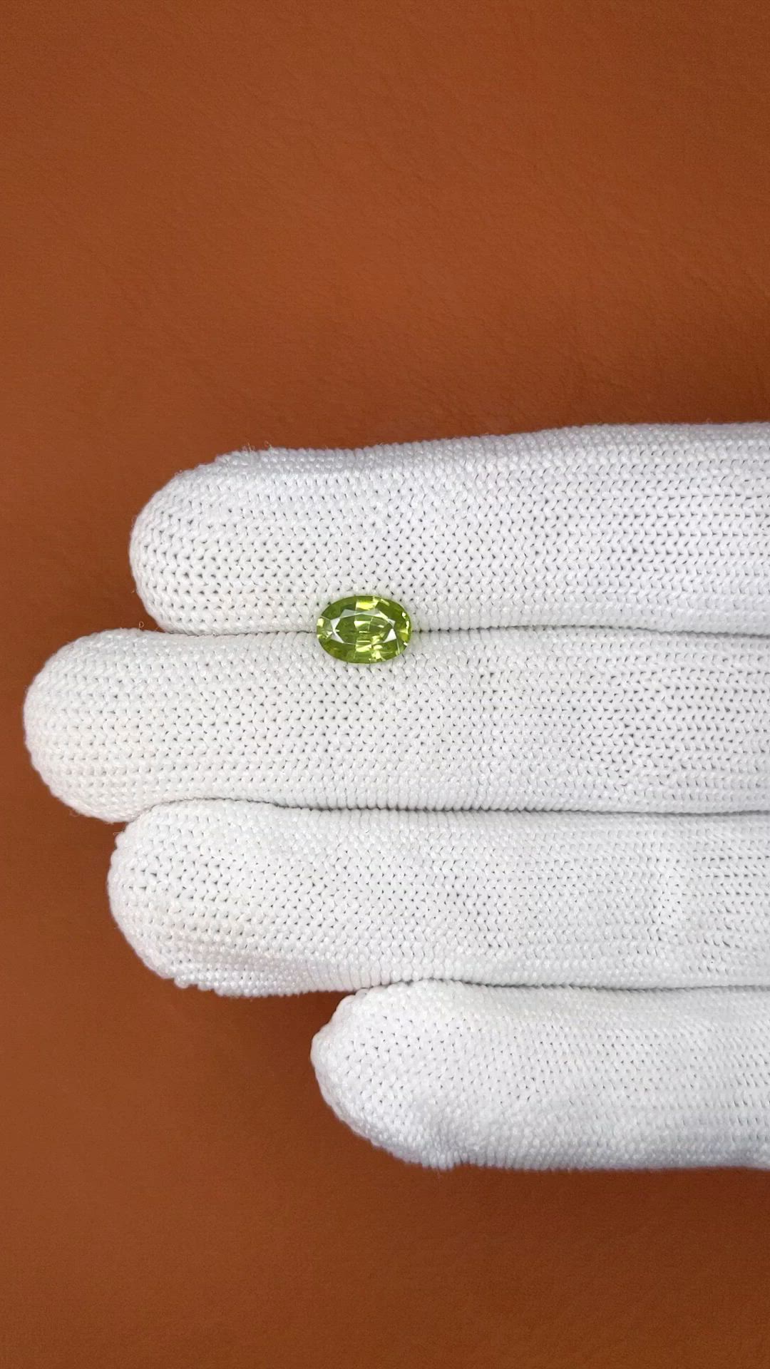 1.57 Ct. Yellowish Green Zircon from Ceylon (Sri Lanka) Size Video
