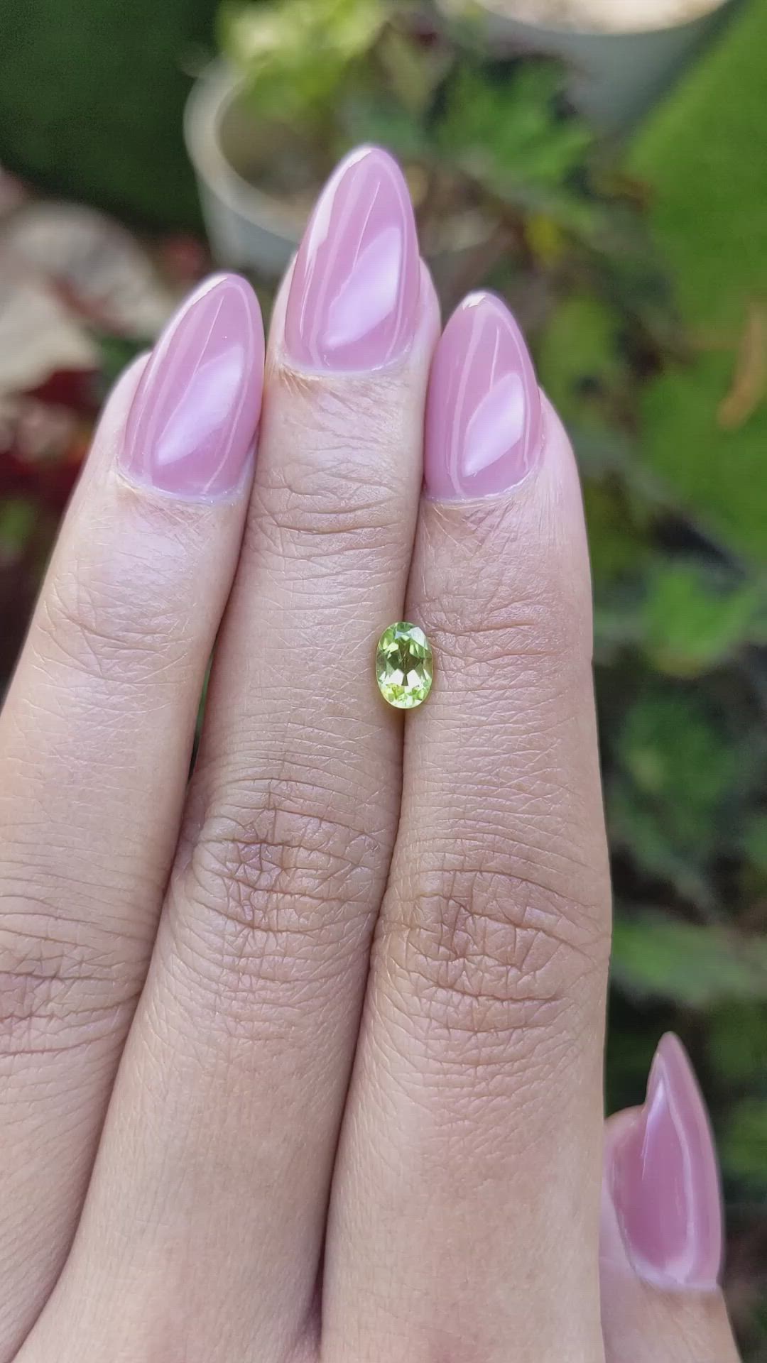 0.61 Ct. Yellowish Green Peridot from Ceylon (Sri Lanka) Size Video
