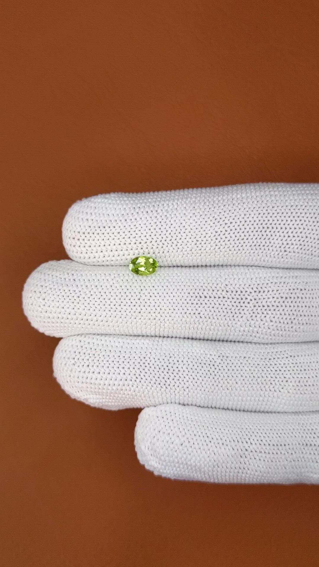 0.57 Ct. Yellowish Green Peridot from Ceylon (Sri Lanka) Size Video