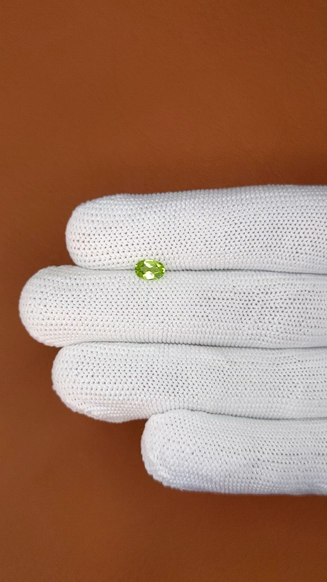 0.51 Ct. Yellowish Green Peridot from Ceylon (Sri Lanka) Size Video