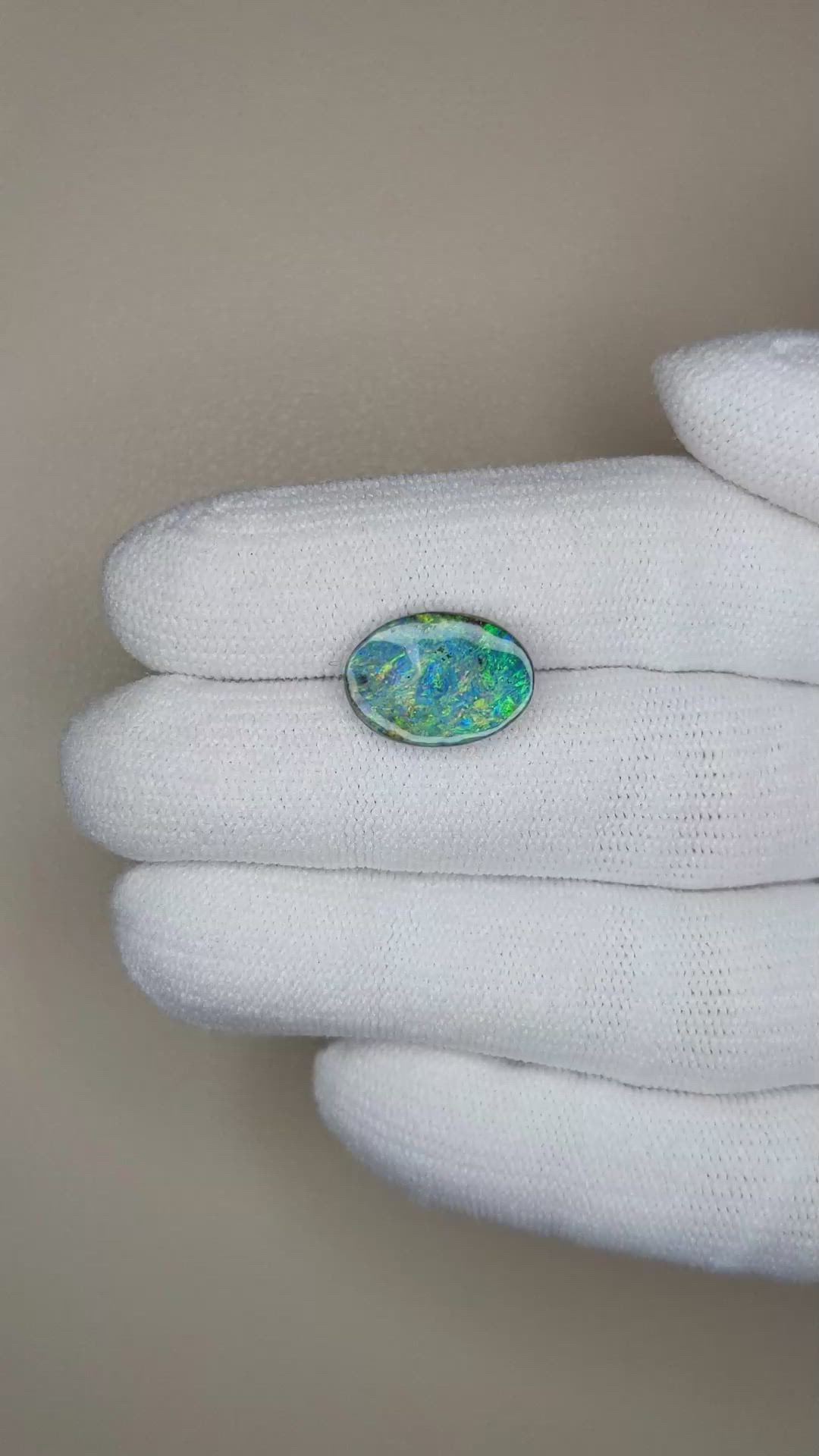 3.61 Ct. Boulder Opal from Australia Size Video