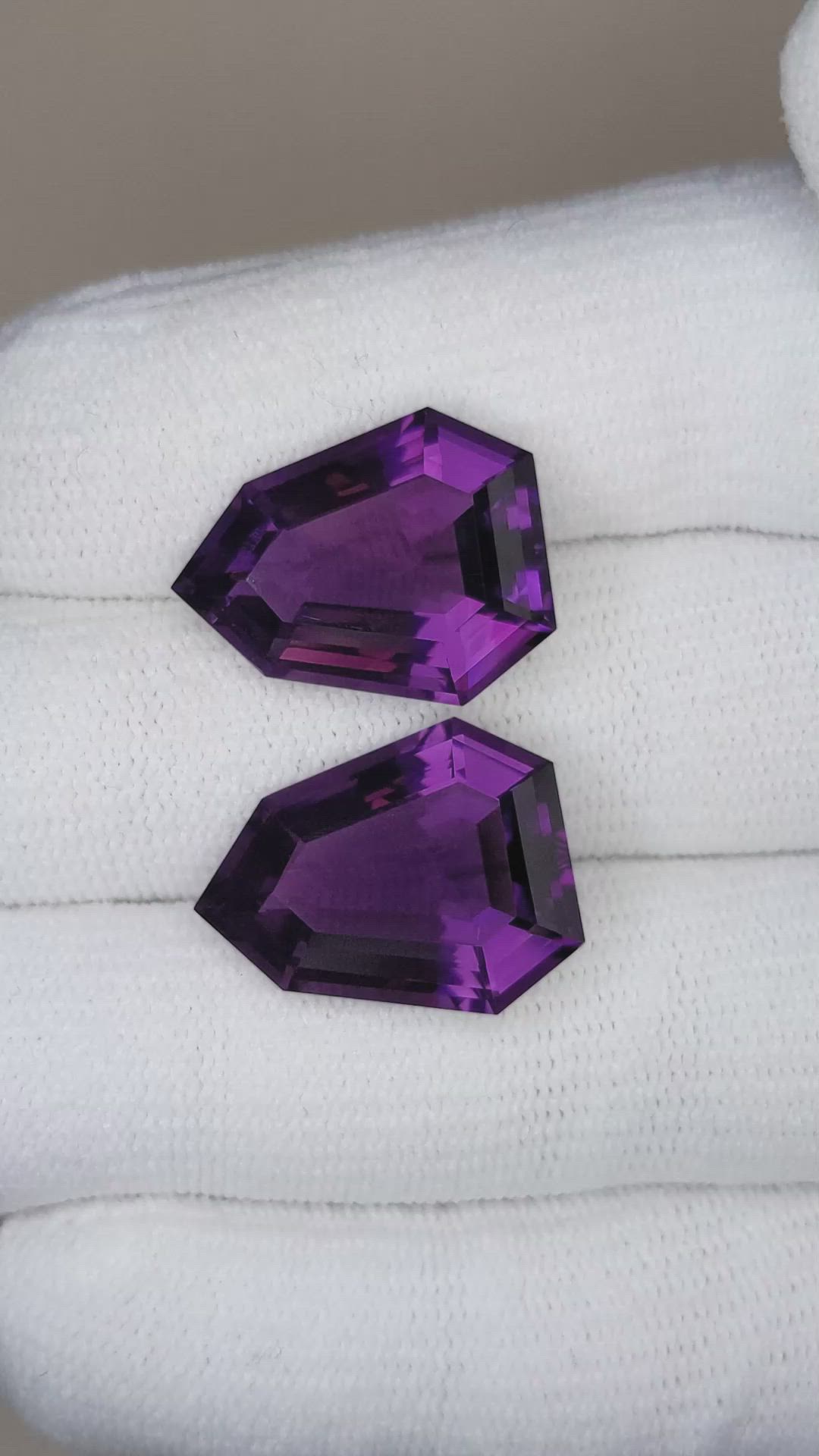 25.26&nbsp;Ct.Tw.Total Carat Weight Amethyst Pair from Bolivia Size Video