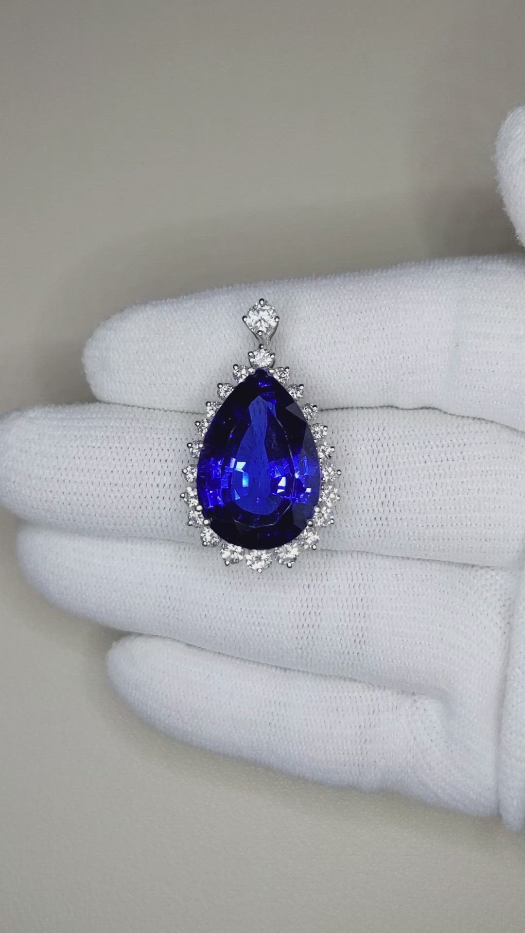 15.93 Ct. Blue Tanzanite and Natural Diamond Halo Brooch, 18K White Gold Size Video