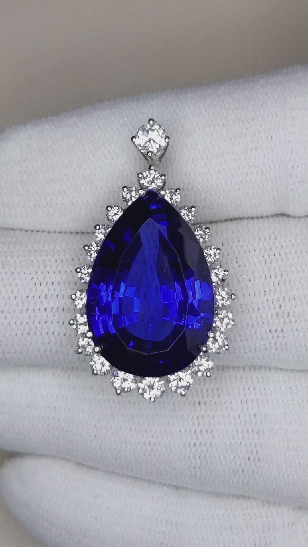 15.93 Ct. Blue Tanzanite and Natural Diamond Halo Brooch, 18K White Gold Size Video